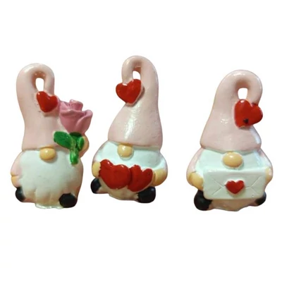 Manócska rózsaszín, szívecskés sapiban - 1db Manócska rózsaszín, szívecskés sapiban - 1db