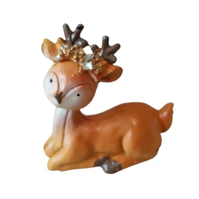 Fejdíszes fekvő őzike