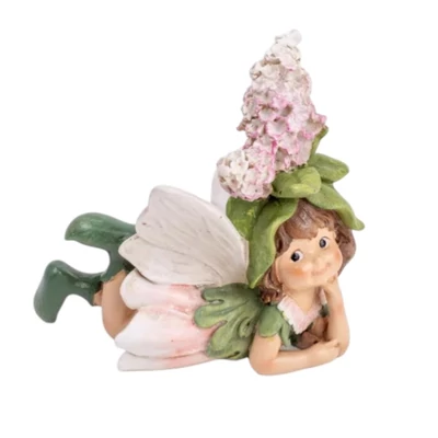 Bájos virágtündérke rózsaszín virágsapiban, fekvő, nagy