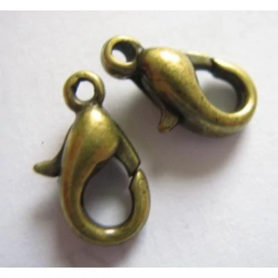 Kapocs - delfin - antik színű